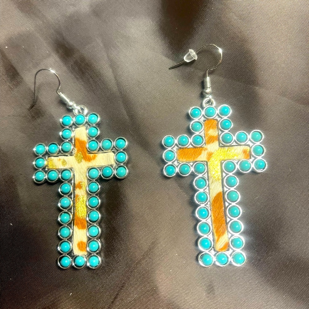 Faux leather cow print cross earrings with turquoise